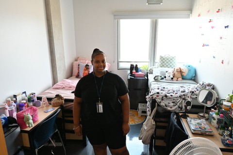 Young student in residence hall room