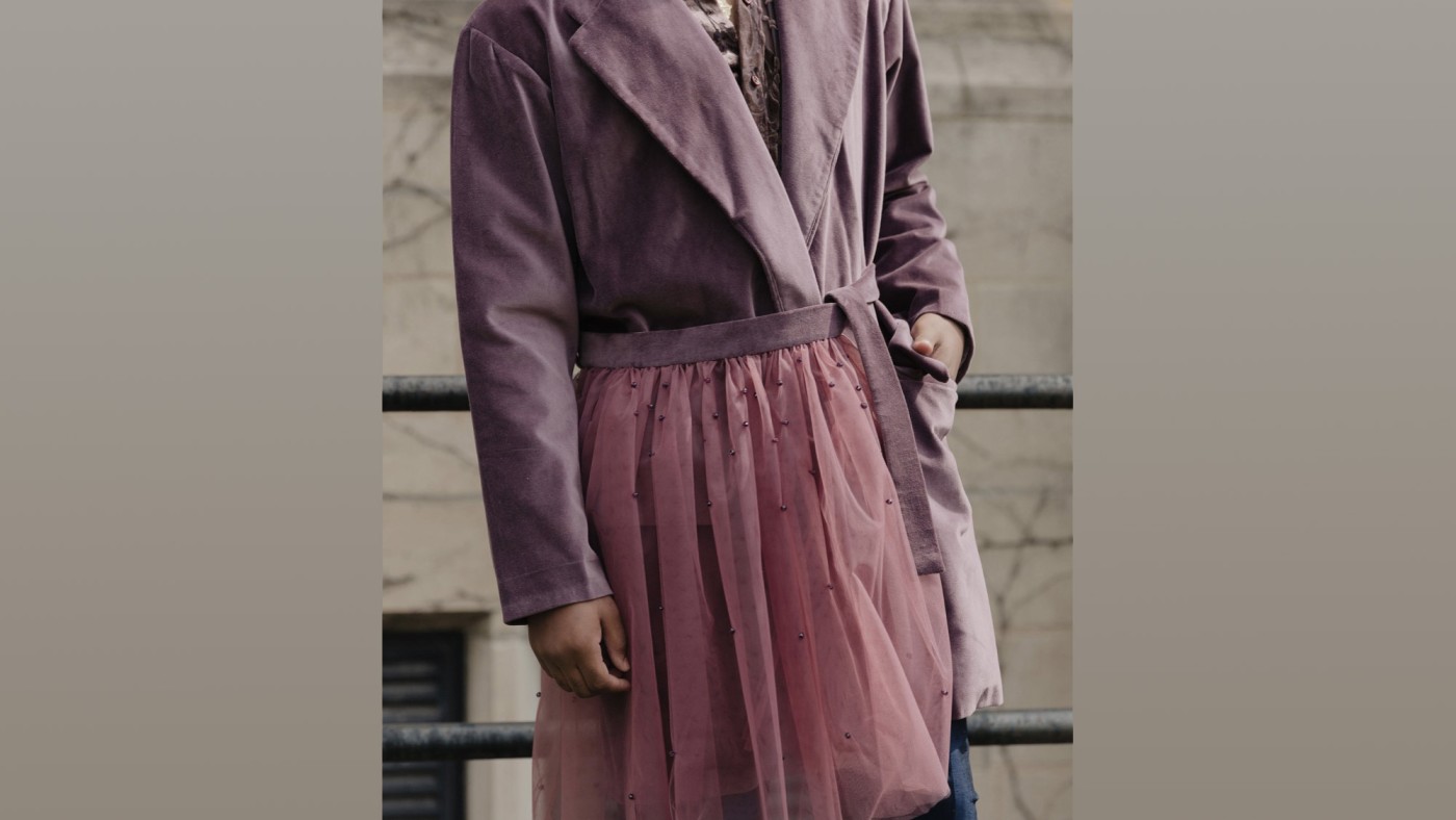 Model wearing outfit designed by student at Dominican University's Annual Fashion Show.