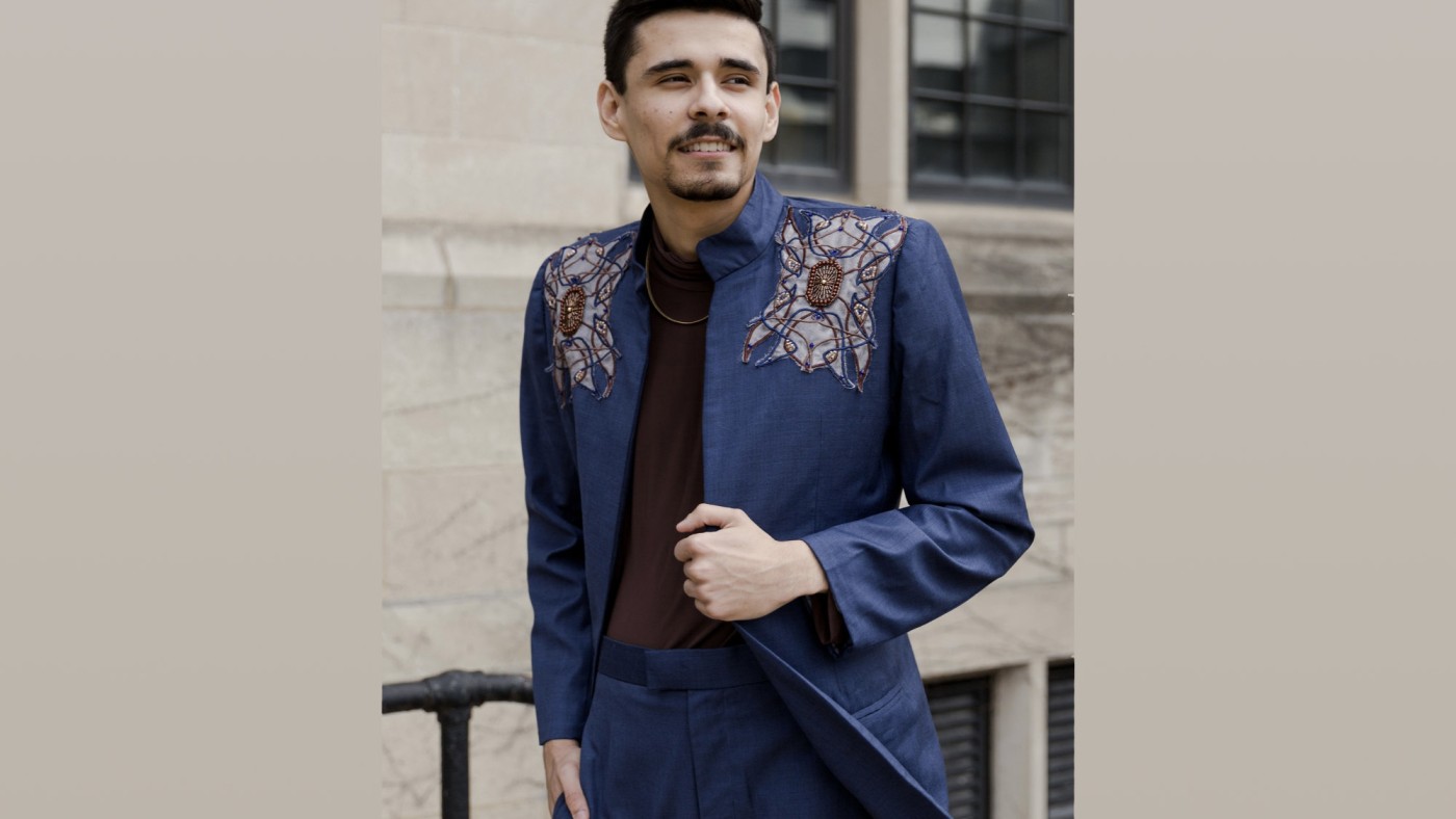 Model wearing outfit designed by student at Dominican University's Annual Fashion Show.