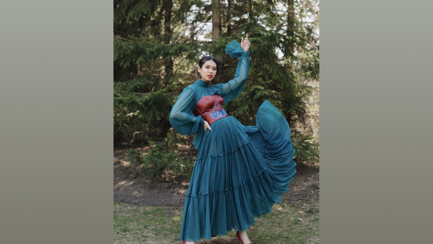 Model wearing outfit designed by student at Dominican University's Annual Fashion Show.