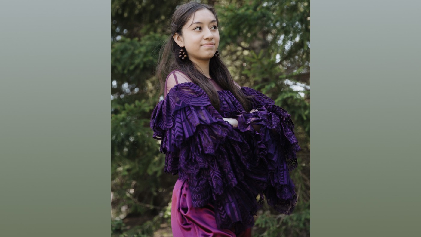 Model wearing outfit designed by student at Dominican University's Annual Fashion Show.