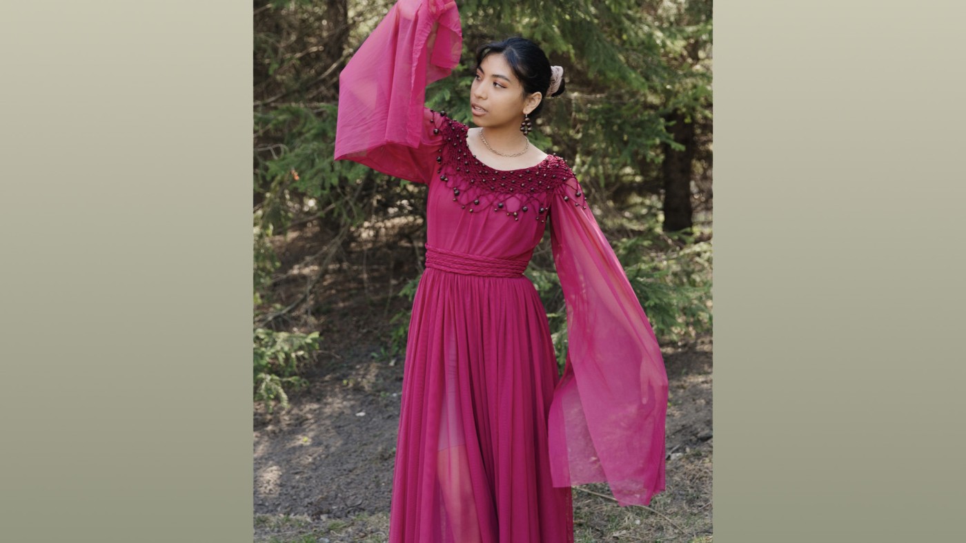 Model wearing outfit designed by student at Dominican University's Annual Fashion Show.