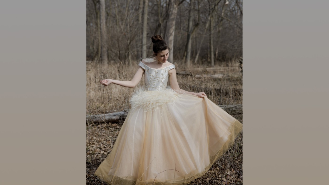 Model wearing outfit designed by student at Dominican University's Annual Fashion Show.