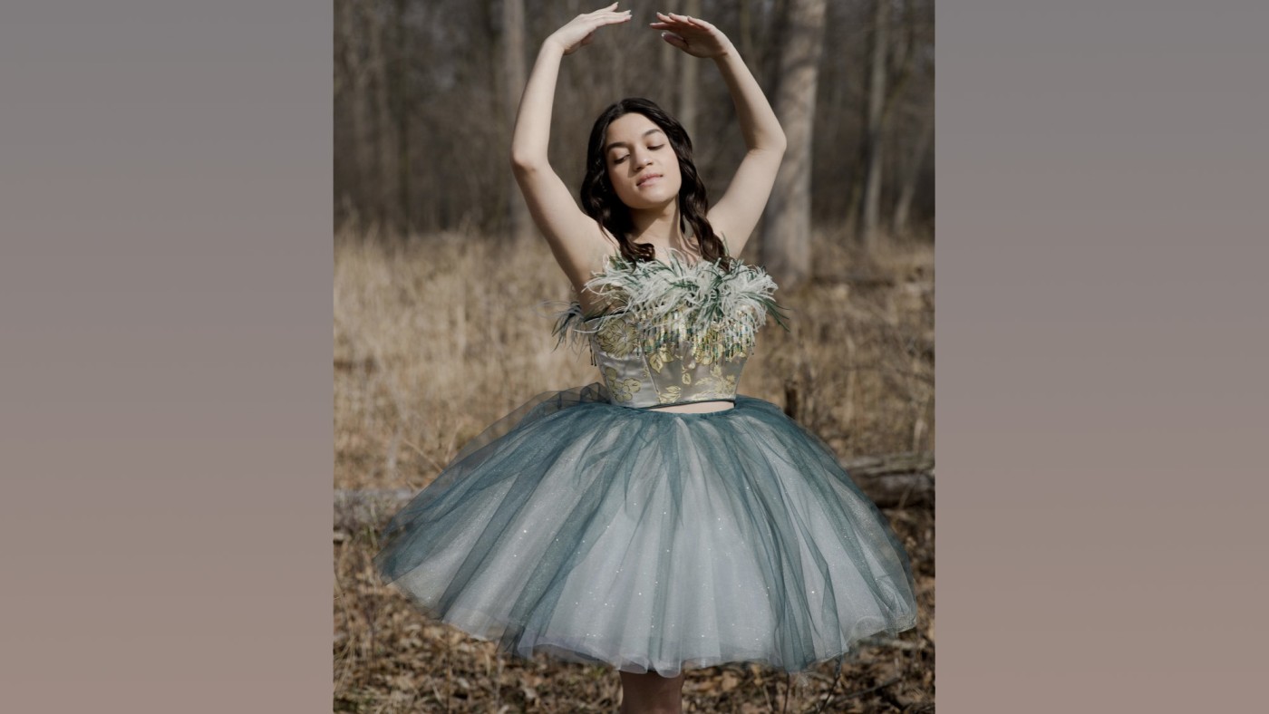 Model wearing outfit designed by student at Dominican University's Annual Fashion Show.