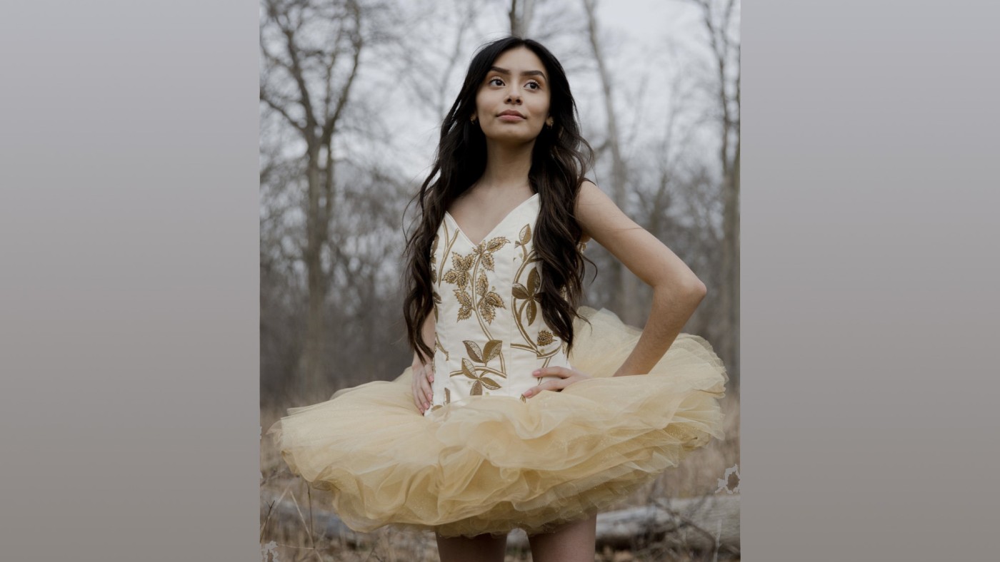 Model wearing outfit designed by student at Dominican University's Annual Fashion Show.