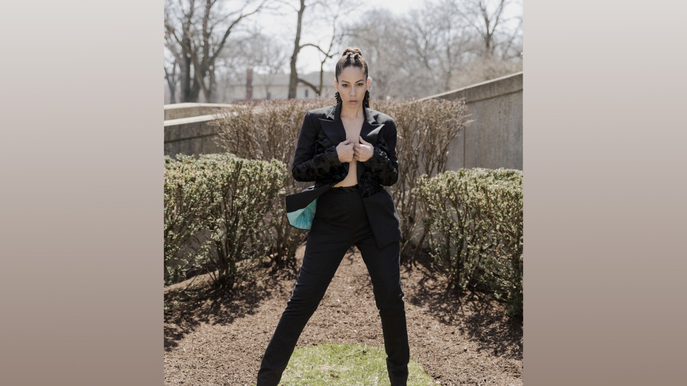 Model wearing outfit designed by student at Dominican University's Annual Fashion Show.