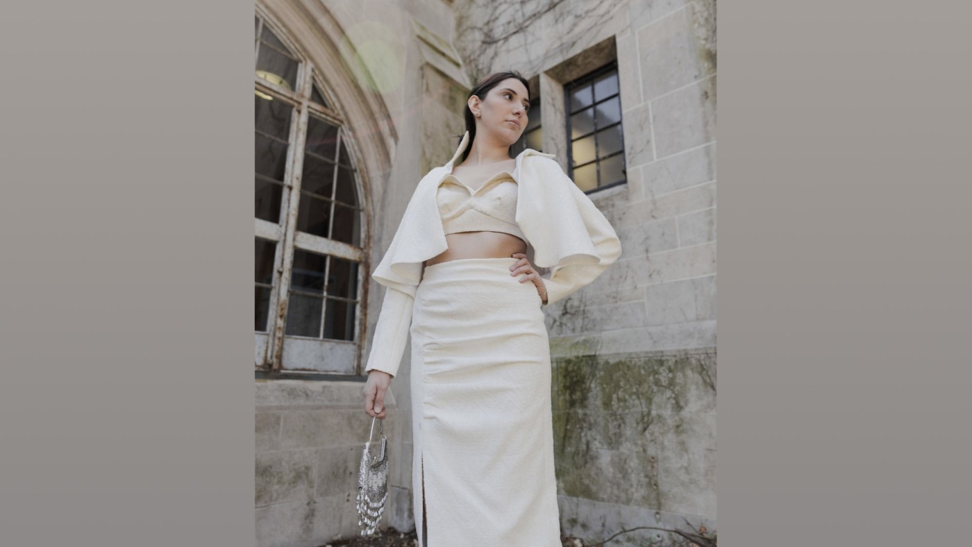 Model wearing outfit designed by student at Dominican University's Annual Fashion Show.