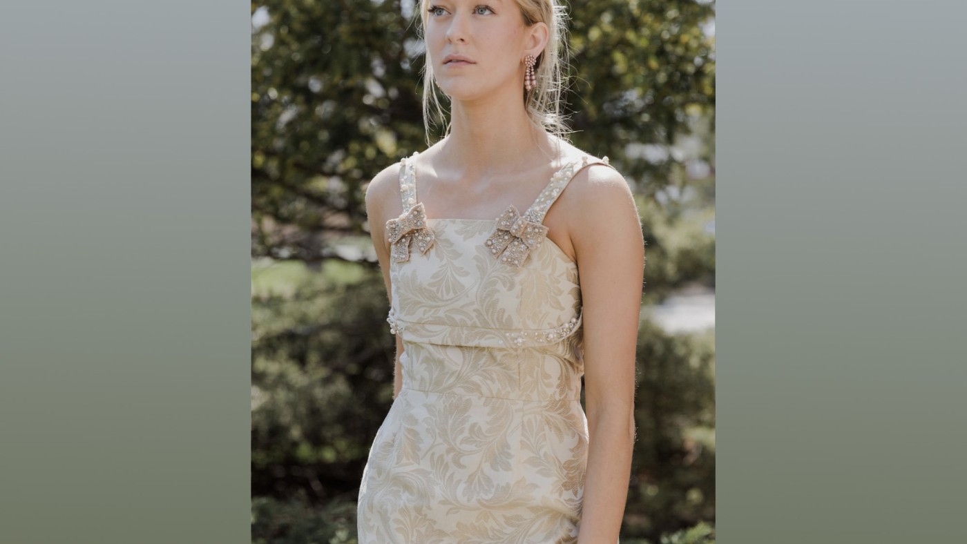 Model wearing outfit designed by student at Dominican University's Annual Fashion Show.