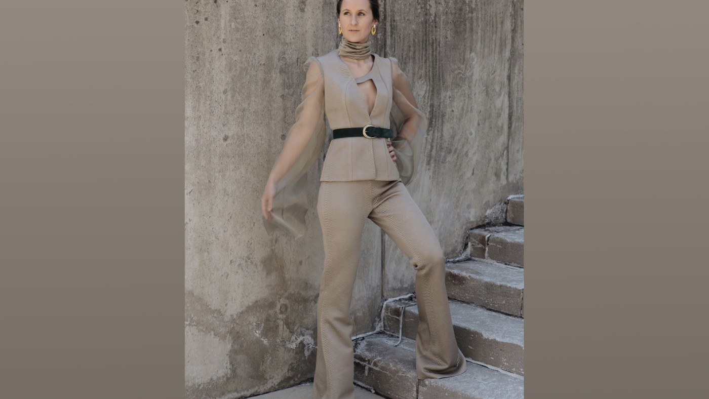 Model wearing outfit designed by student at Dominican University's Annual Fashion Show.