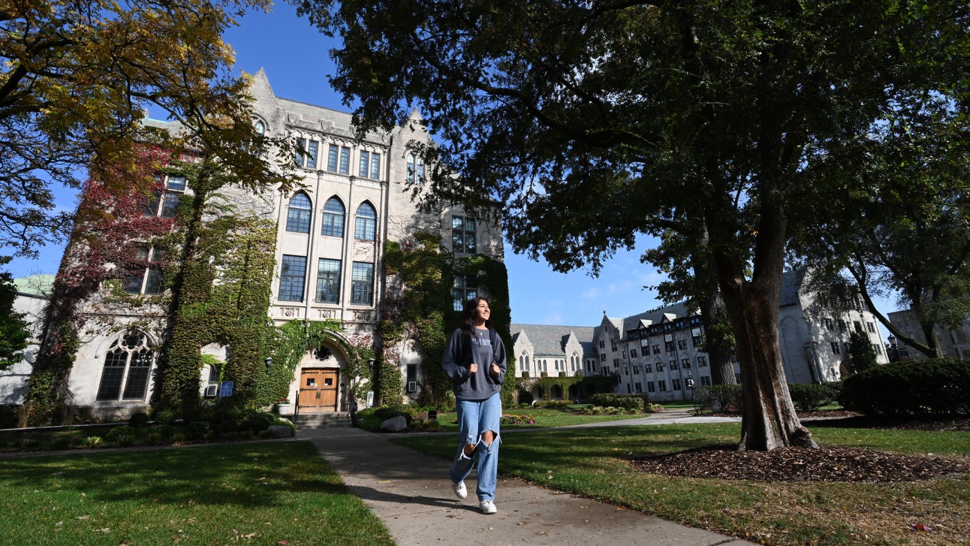 Femail student walking on campus
