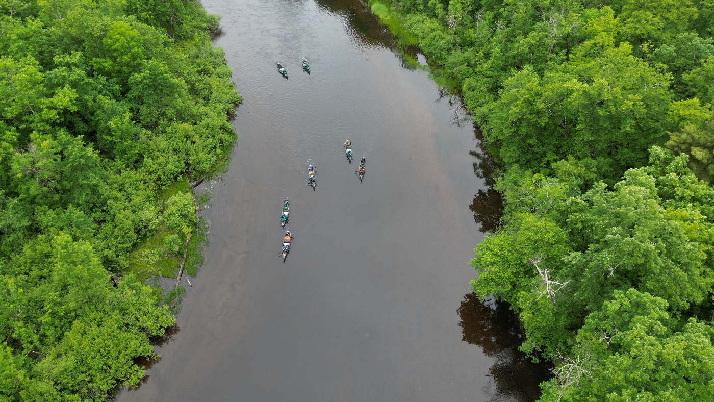 Overview of the river with students in boats
