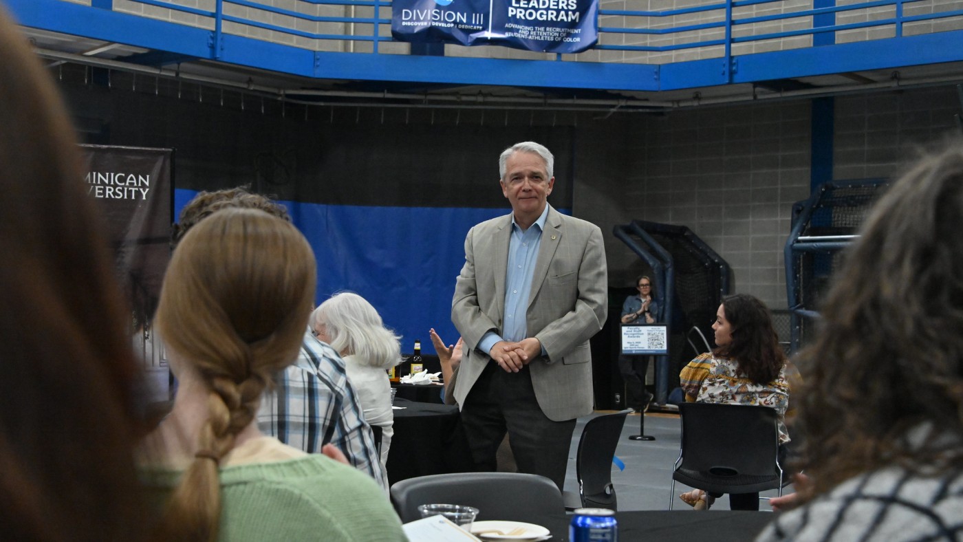 Faculty member with students