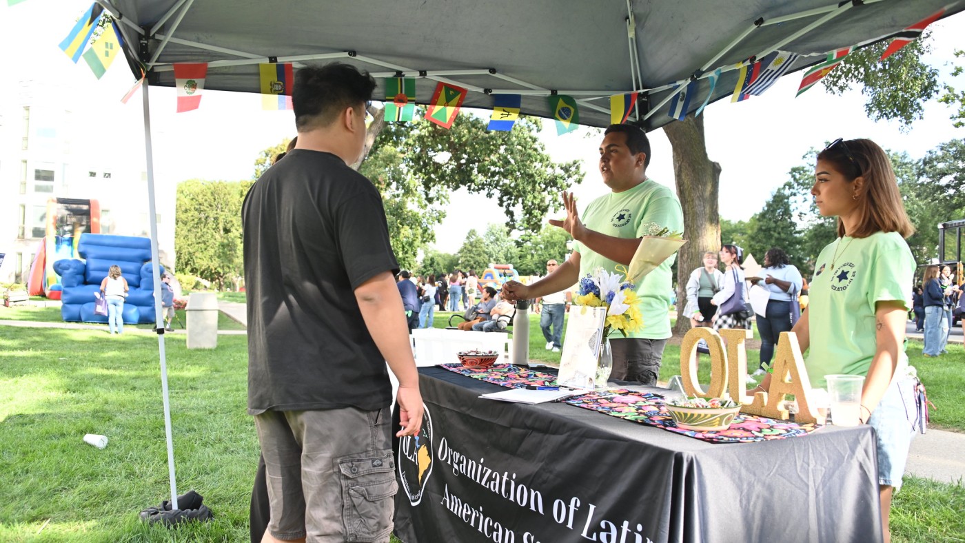 Students at booth at DUFest