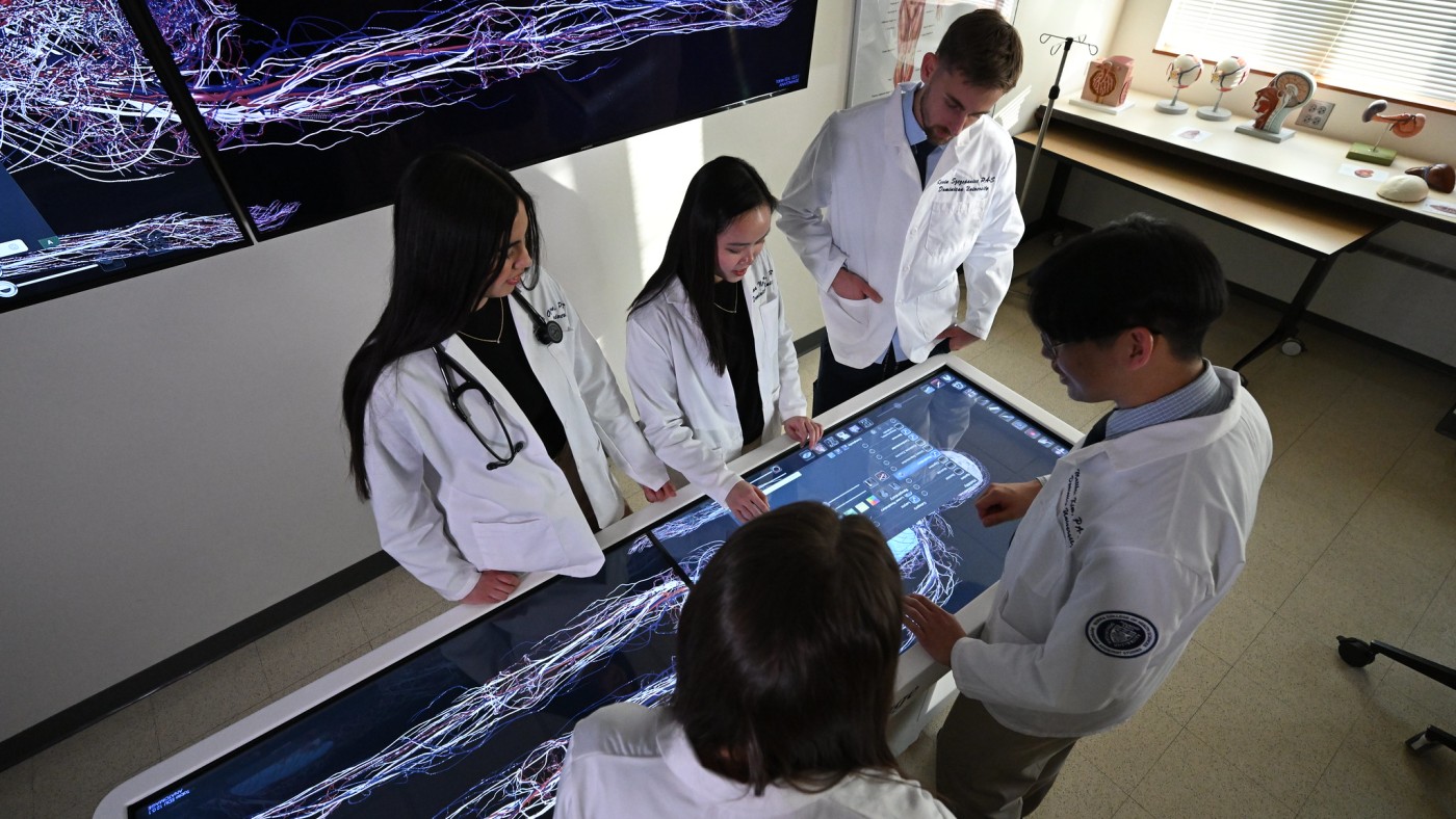 Students and faculty at Anatomage table