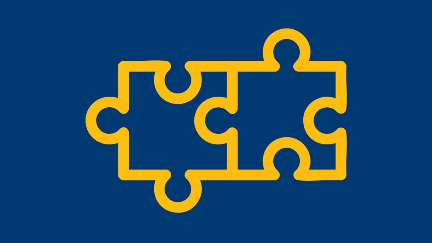 Two interconnected puzzle pieces icon