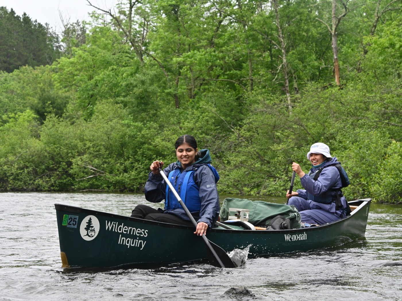 Two students on a rowboar