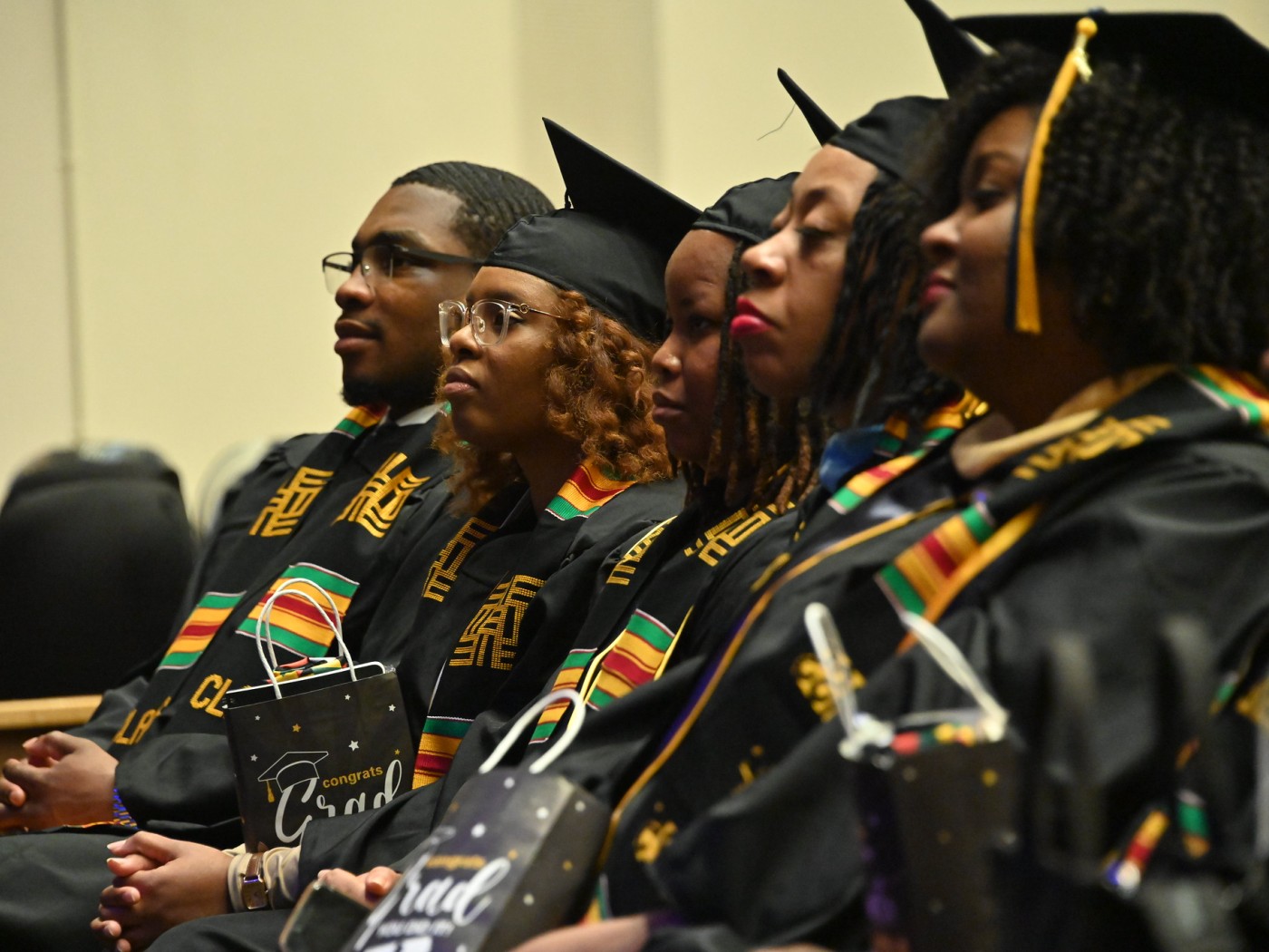 Black students in Commencement regalia