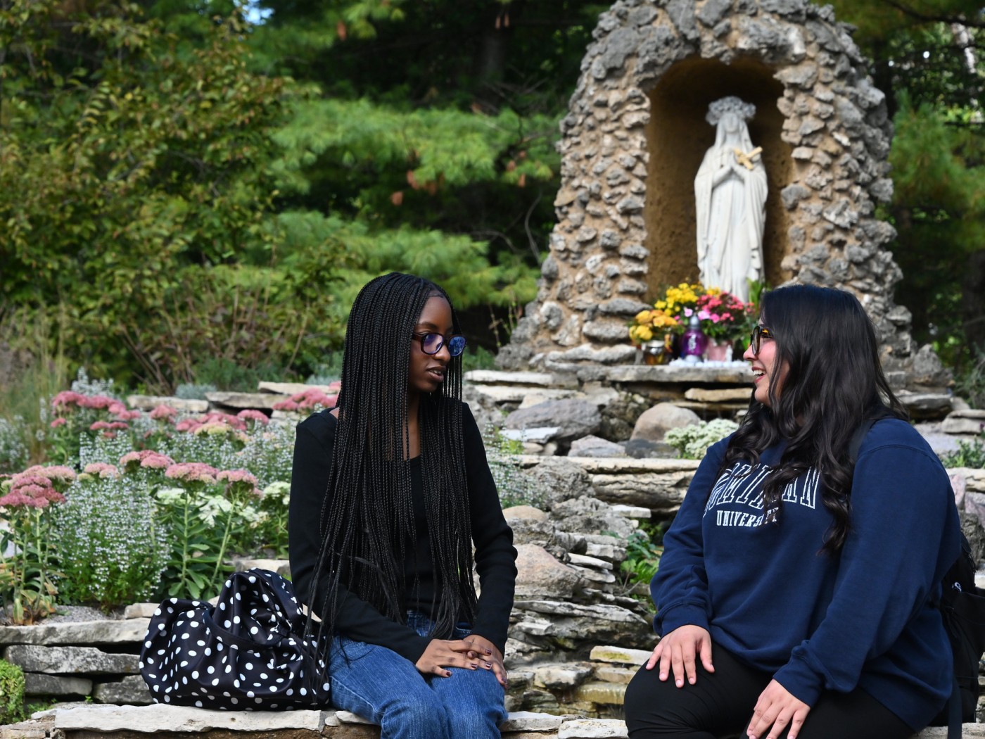 Two female students at the Grotto