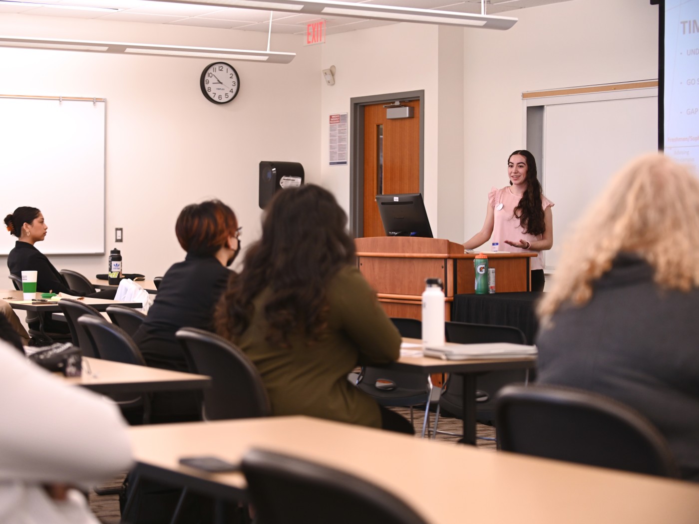 A student presents her research at Dominican University's SI Expo
