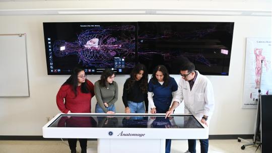 Students and faculty at anatomage
